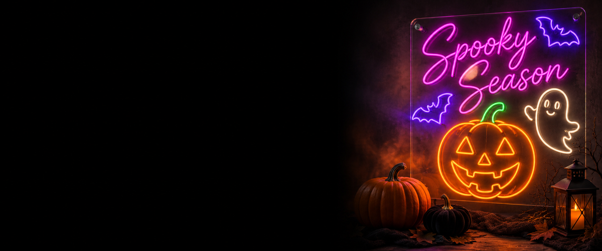 Spooky Season pink LED neon sign with an orange pumpkin, a friendly ghost and purple bats