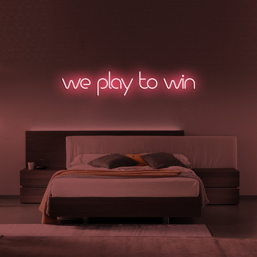 We Play to Win LED Neon Sign in Light Pink