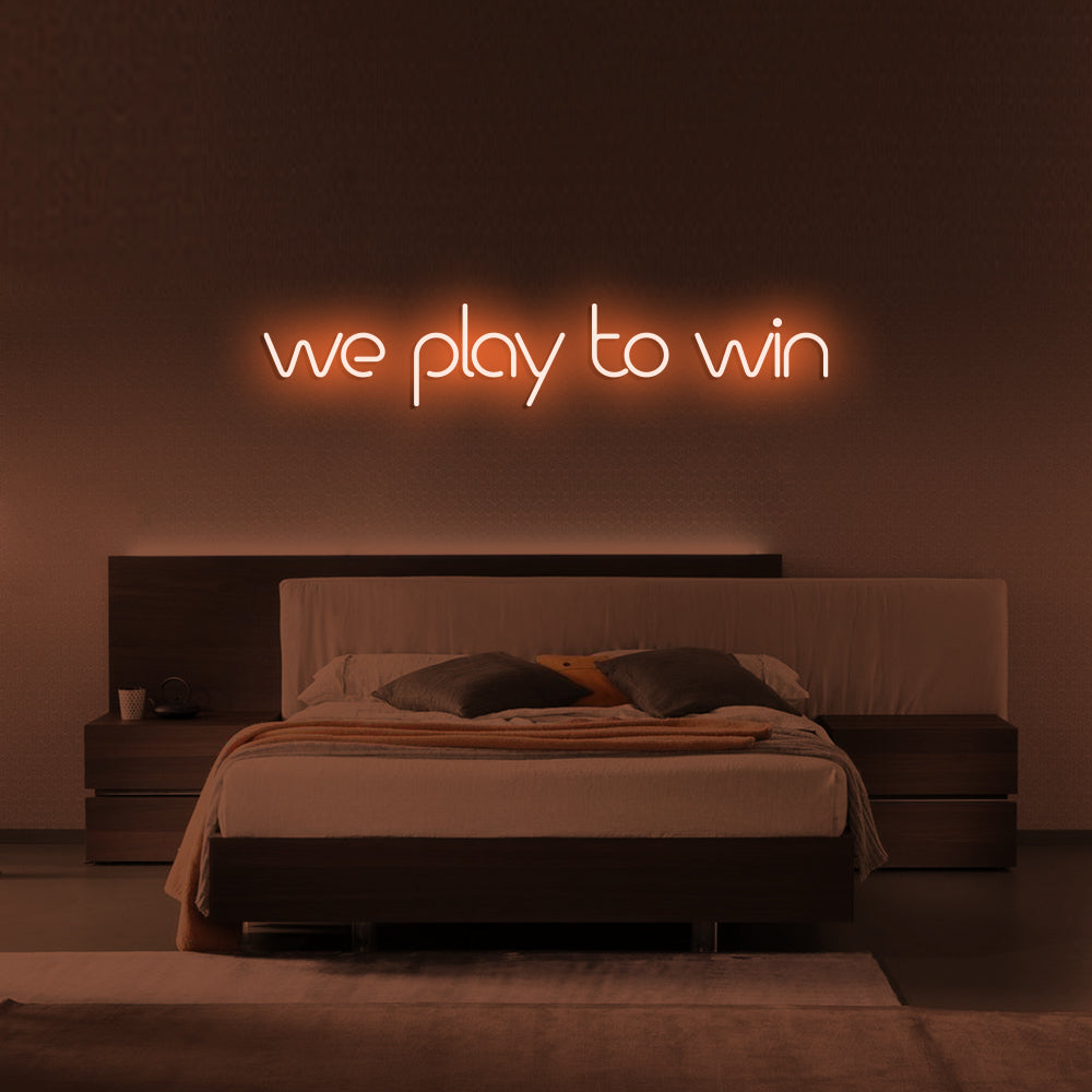 We Play to Win LED Neon Sign in Orange