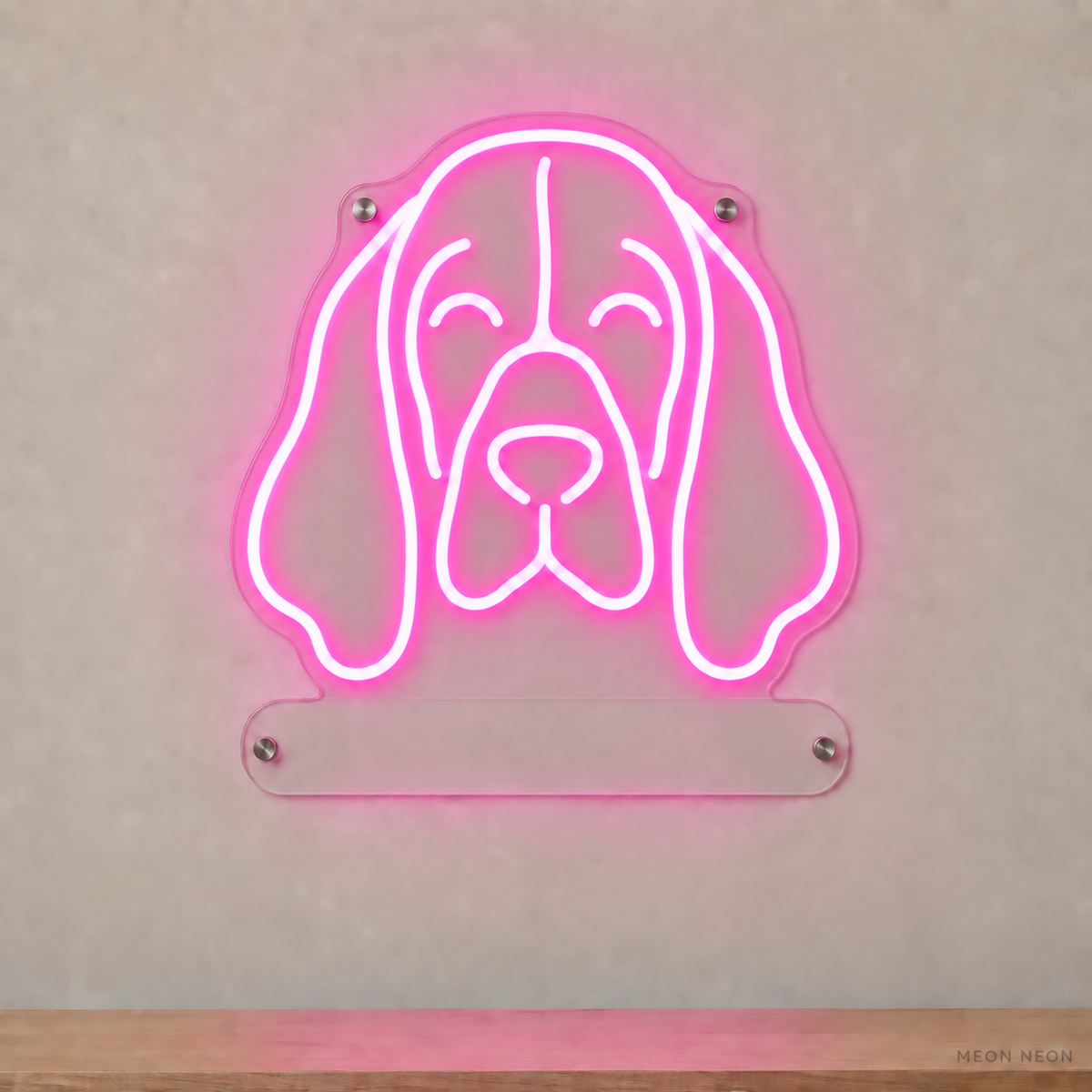 MEON NEON-watermarked concept mockup of a Pink Basset Hound head LED neon sign with a blank acrylic area for a UV-printed breed caption or dog name.