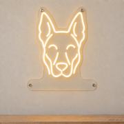MEON NEON-watermarked concept mockup of a Warm White Belgian Malinois head LED neon sign with a blank acrylic area for a UV-printed breed caption or dog name.
