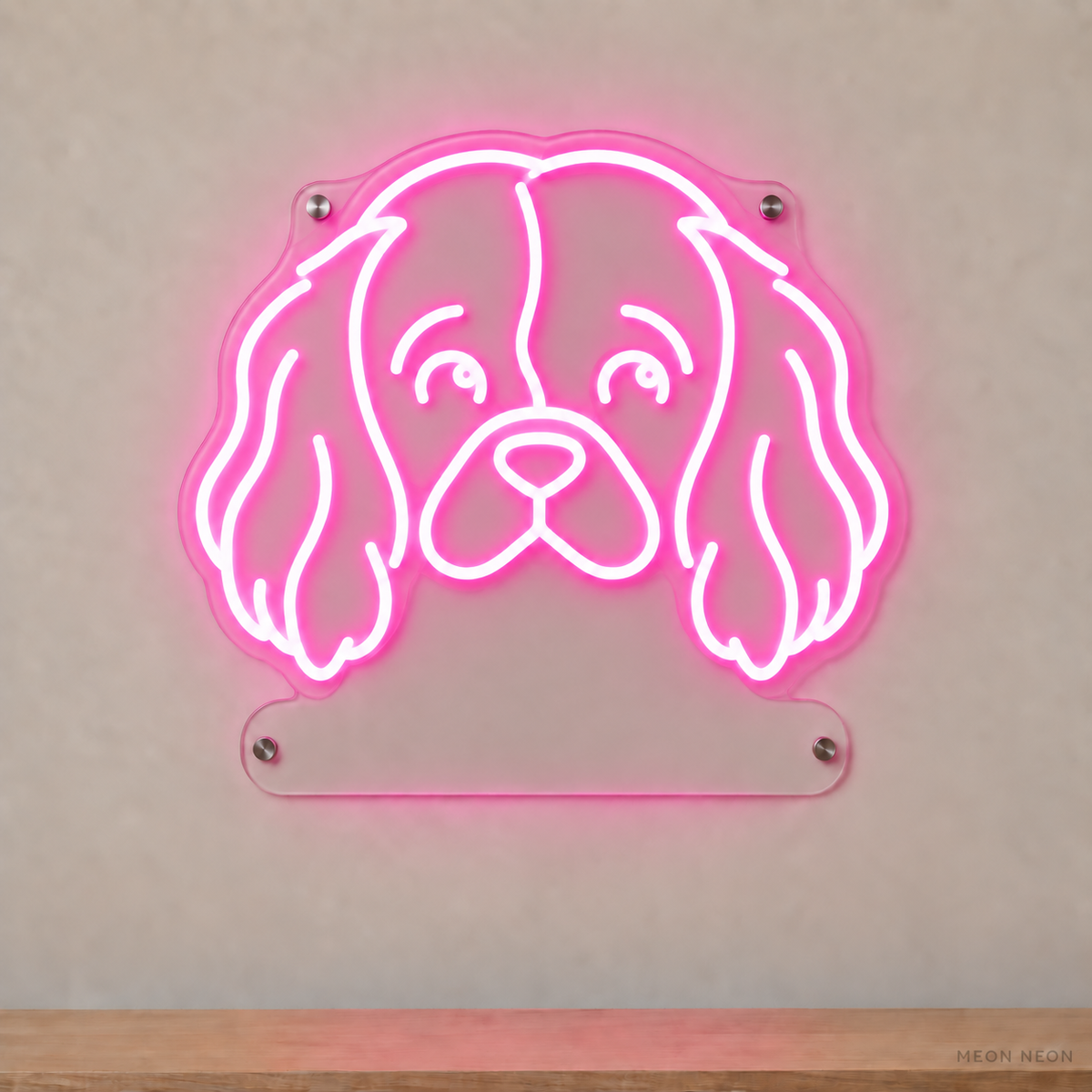 MEON NEON-watermarked concept mockup of a Pink Cavalier King Charles Spaniel head LED neon sign with a blank acrylic area for a UV-printed breed caption or dog name.