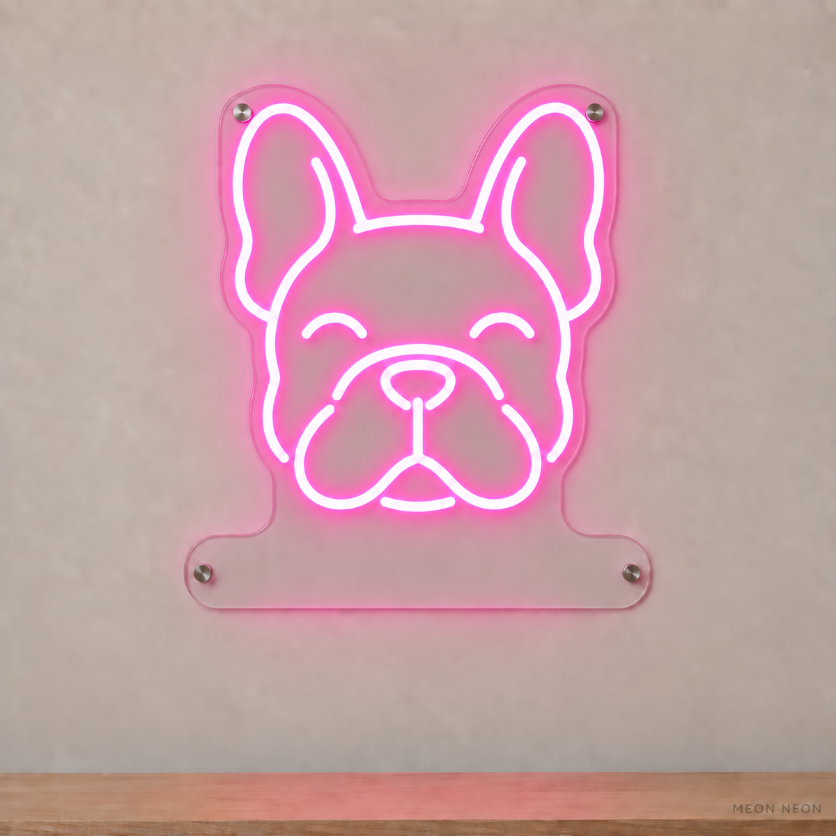 MEON NEON-watermarked concept mockup of a Pink French Bulldog head LED neon sign with a blank acrylic area for a UV-printed breed caption or dog name.