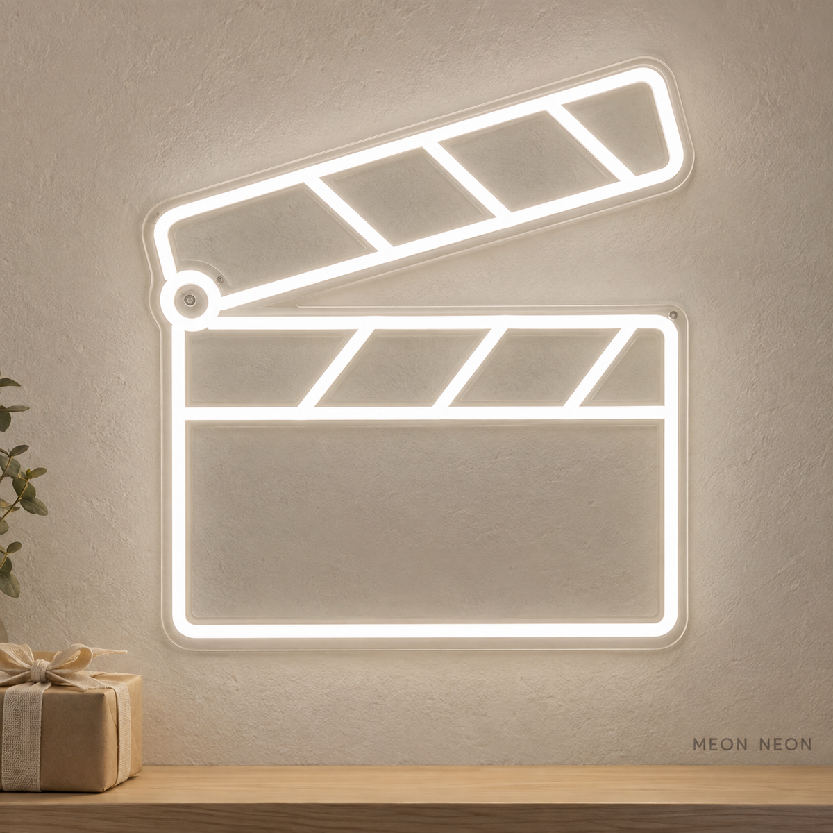 Watermarked concept mockup of the Mini Cinema Clapperboard LED Neon Sign in White on a clear acrylic backboard.