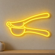 Watermarked concept mockup of Mini Citrus Press LED Neon Sign in Yellow on a clear acrylic backboard.