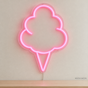 Watermarked concept mockup of Mini Cotton Candy LED Neon Sign in Pink on a clear acrylic backboard.