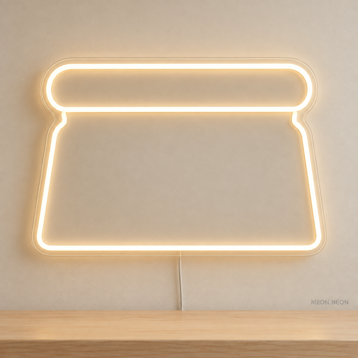 Watermarked concept mockup of Mini Dough Scraper LED Neon Sign in Warm White on a clear acrylic backboard.