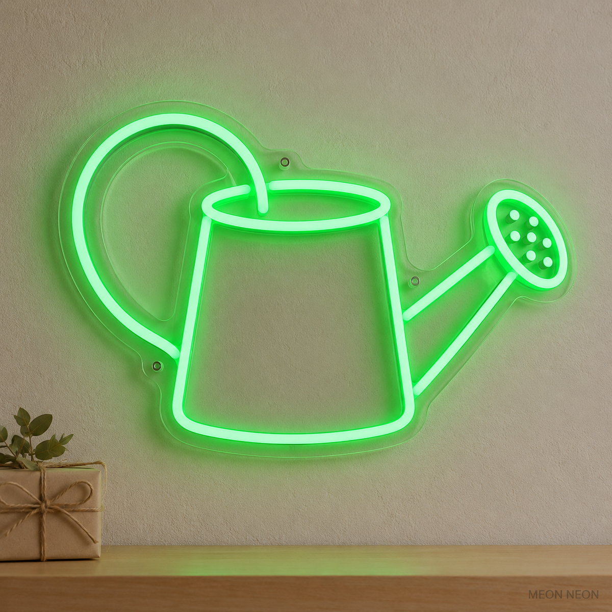 Watermarked concept mockup of the Mini Garden Watering Can LED Neon Sign in Green on a clear acrylic backboard.