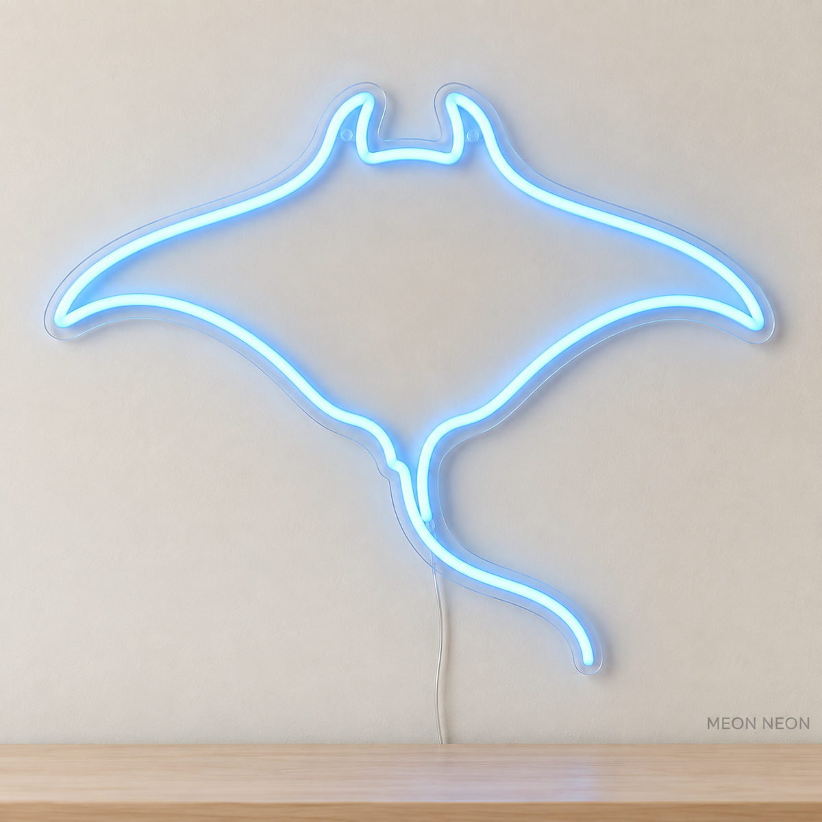 Watermarked concept mockup of Mini Manta Ray LED Neon Sign in Ice Blue on a clear acrylic backboard.