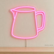 Watermarked concept mockup of Mini Milk Pitcher LED Neon Sign in Pink on a clear acrylic backboard.