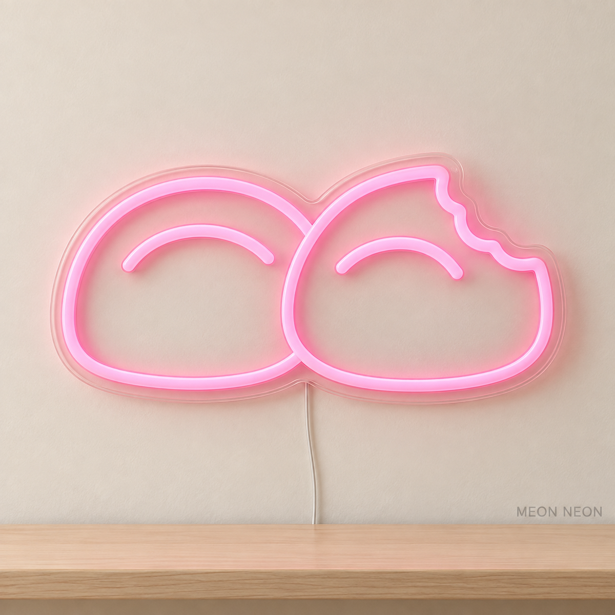 Watermarked concept mockup of Mini Mochi Pair LED Neon Sign in Pink on a clear acrylic backboard.