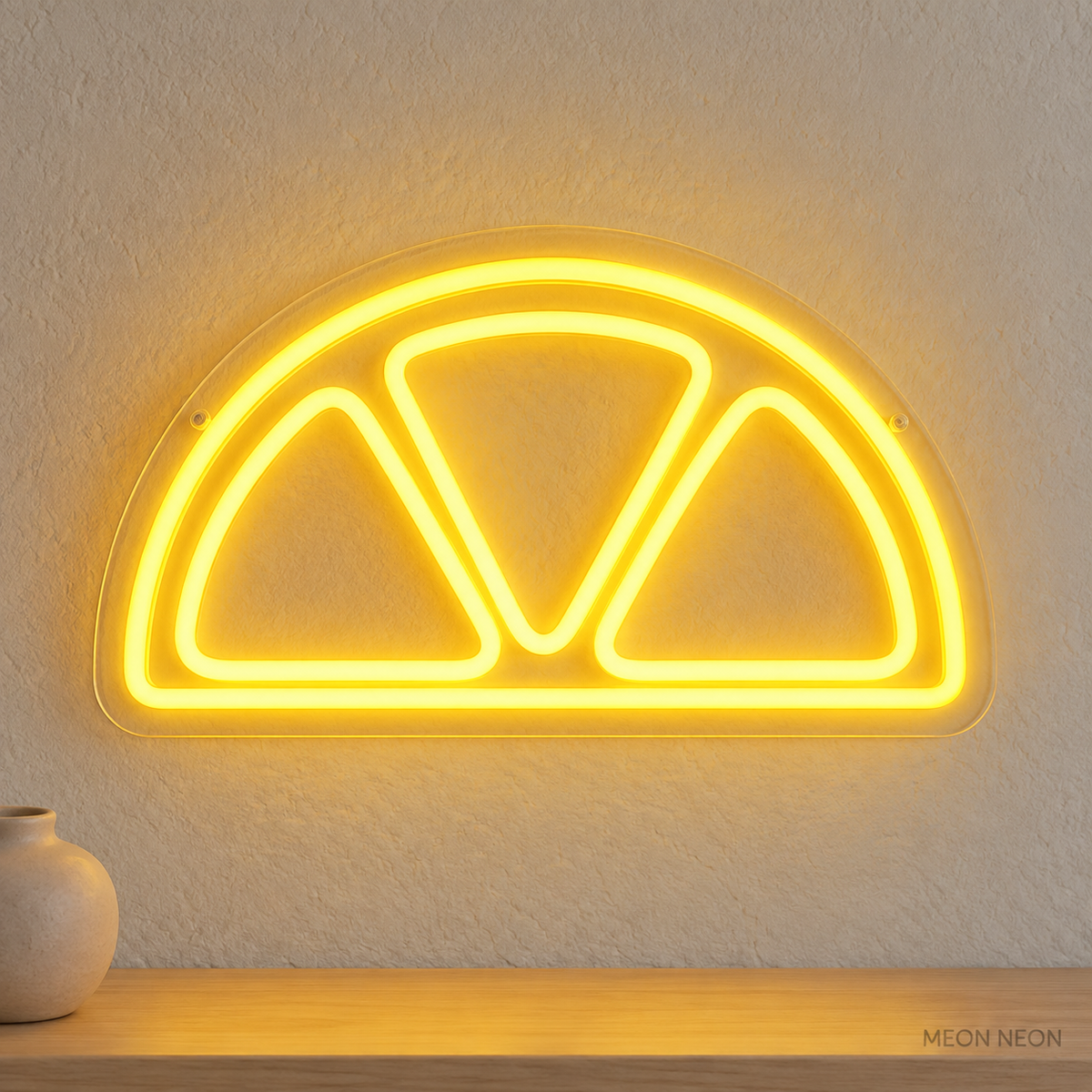 Watermarked concept mockup of Mini Orange Slice LED Neon Sign in Yellow on a clear acrylic backboard.