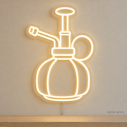 Watermarked concept mockup of Mini Plant Mister LED Neon Sign in Warm White on a clear acrylic backboard.