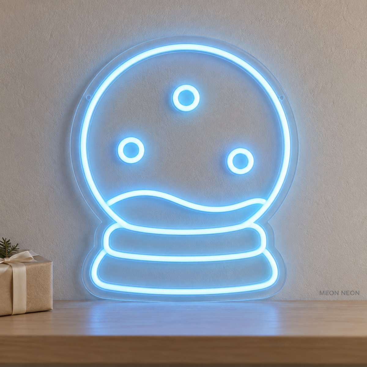 Watermarked concept mockup of the Mini Snow Globe LED Neon Sign in Ice Blue on a clear acrylic backboard.