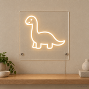 Personalized Little Dinosaur LED neon sign concept in Warm White with a blank area for printed text; MEON NEON watermark