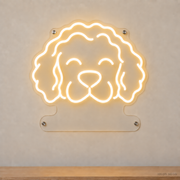 MEON NEON-watermarked concept mockup of a Warm White Portuguese Water Dog head LED neon sign with a blank acrylic area for a UV-printed breed caption or dog name.