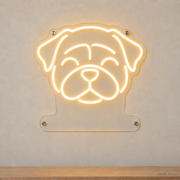 MEON NEON-watermarked concept mockup of a Warm White Pug head LED neon sign with a blank acrylic area for a UV-printed breed caption or dog name.