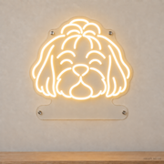 MEON NEON-watermarked concept mockup of a Warm White Shih Tzu head LED neon sign with a blank acrylic area for a UV-printed breed caption or dog name.