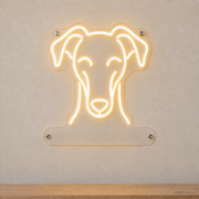 MEON NEON-watermarked concept mockup of a Warm White Whippet head LED neon sign with a blank acrylic area for a UV-printed breed caption or dog name.