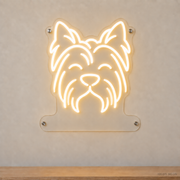 MEON NEON-watermarked concept mockup of a Warm White Yorkshire Terrier head LED neon sign with a blank acrylic area for a UV-printed breed caption or dog name.